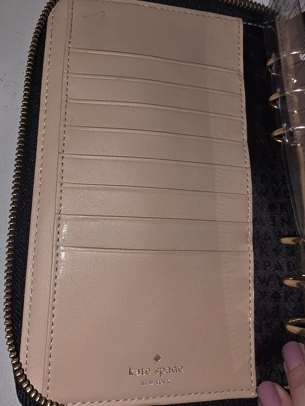 black pebbled leather Kate Spade Wellesley zip-around personal organizer